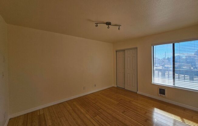 Sunny 2 Bed / 1 Bath Condo with Private Balcony (2nd Floor)