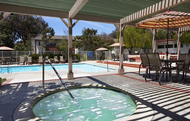 Swimming Pool Area with Shaded Chairs, at Pacific Oaks Apartments, Towbes, Goleta, CA