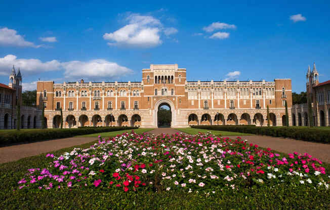 the front with a bed of flowers