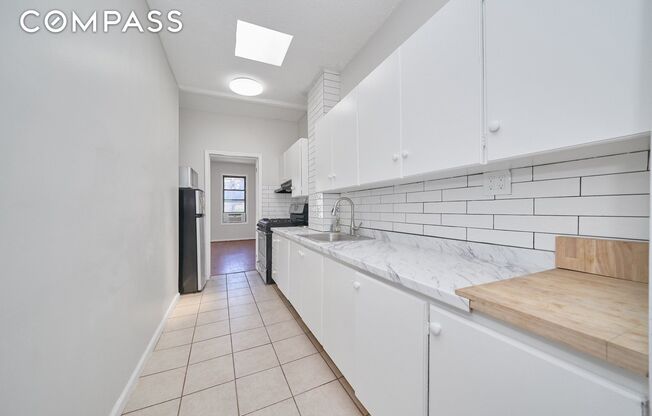 63 E 129 ST