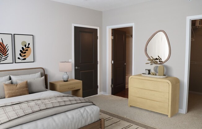 a bedroom with a bed and a dresser with a mirror
