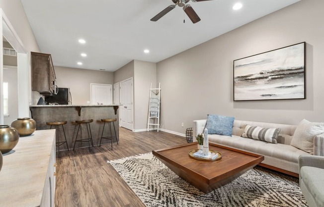 a living room with a couch and a coffee table