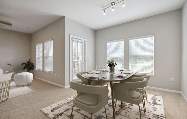 a dining room with a table and chairs