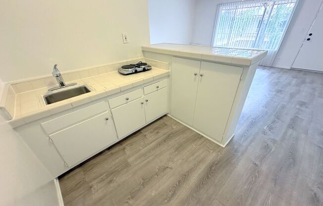 Highly updated 1bd/1ba in Canoga Park, Chatsworth adjacent! Parking included