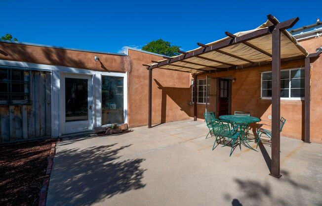 1 MO. FREE RENT! Charming Midtown Santa Fe Home with Yard & Garage