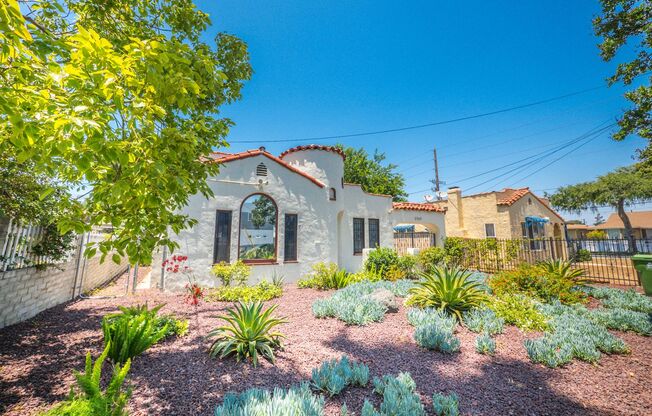 Spanish Style 3 Bed/2 Bath Home w/ Modern Upgrades & Unique Touches ~ W/D Included!