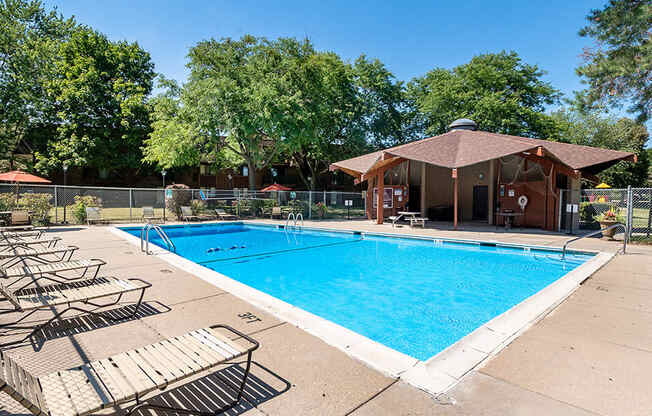 apartment complex with outdoor swimming pool