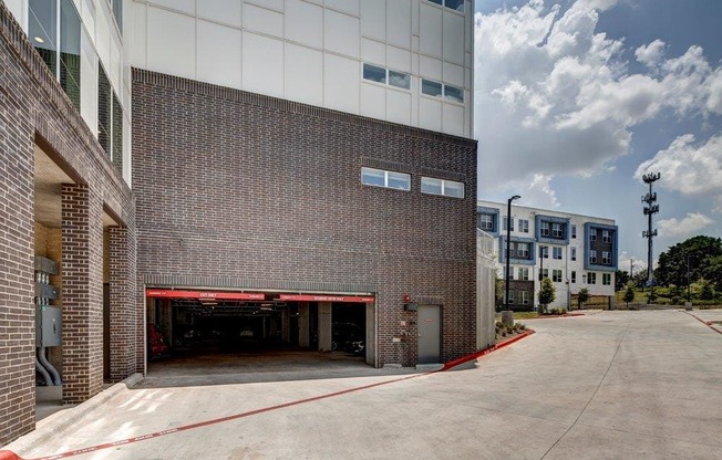 garage door opened entrance at Brixton South Shore, Texas, 78741