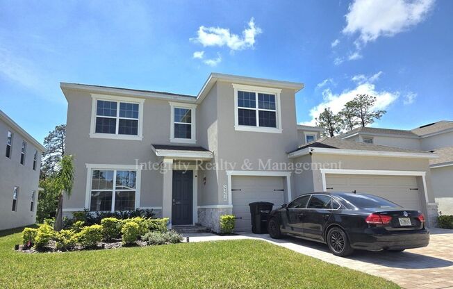 4 Bed/3.5 Bath, 3,275 Sqft - 23216 Pachino Way Lutz, FL 33549