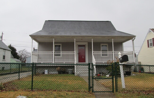 Charming Three-Bedroom Cape Cod-Style Dundalk Home w/ Porch!