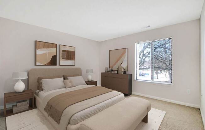 A bedroom with a large bed and two lamps on side tables.