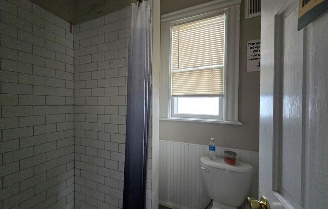 Large 5 Bedroom 2 Bath Single Family Home! Off Street Parking - On Site Laundry!