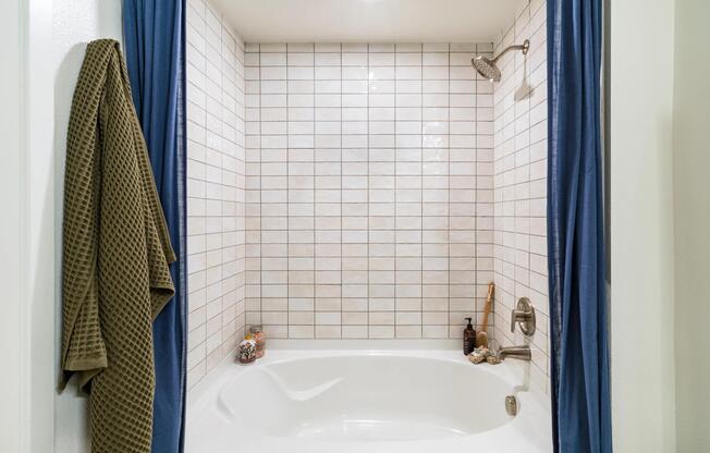 Spa-inspired bathrooms at Modera University Park offer a calm, polished retreat.