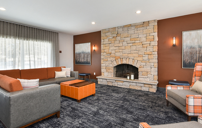 Pines of Burnsville - Clubhouse Seating Area & Fireplace