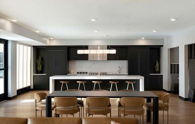 A modern kitchen with a bar area and seating.