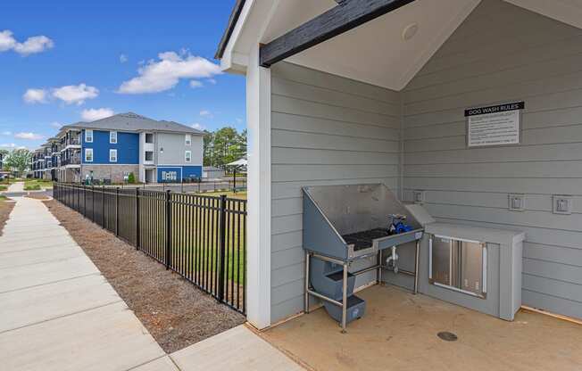 the preserve at ballantyne commons apartments patio and grill area with apartment buildings