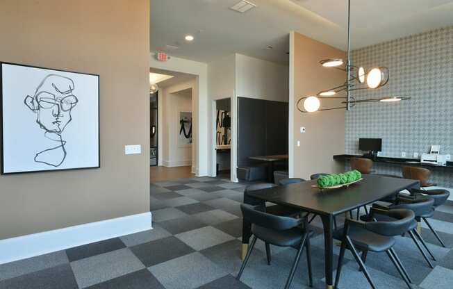 a dining room with a table and chairs