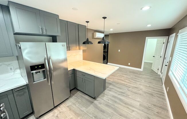 Completely Renovated 2 Bed + 2 Bath House w/Parking! Close to USC, Freeways, and DTLA