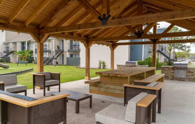 grilling and lounge area in our pearland texas apartment community