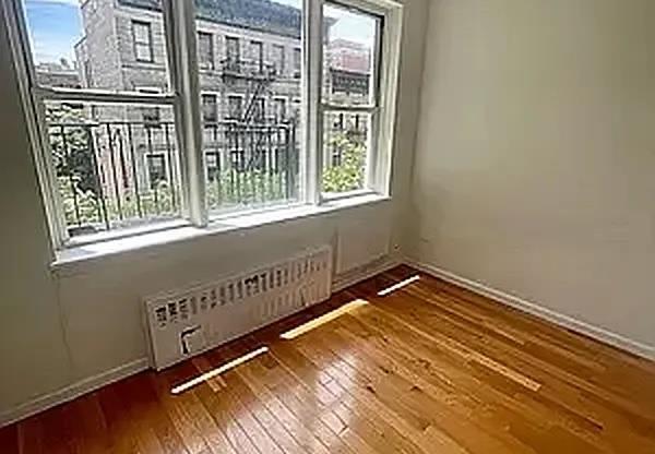 235 E 27 ST