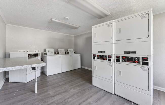 A laundry room with a washer and dryer.