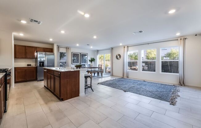 Be the first to live in this brand-new expansive two-story former model home!