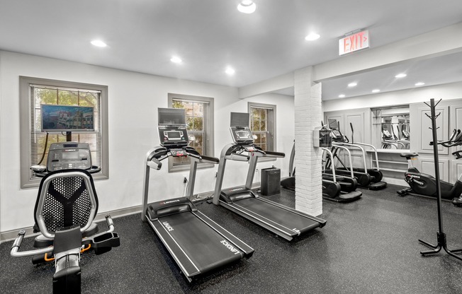 the gym with cardio equipment at the apartments