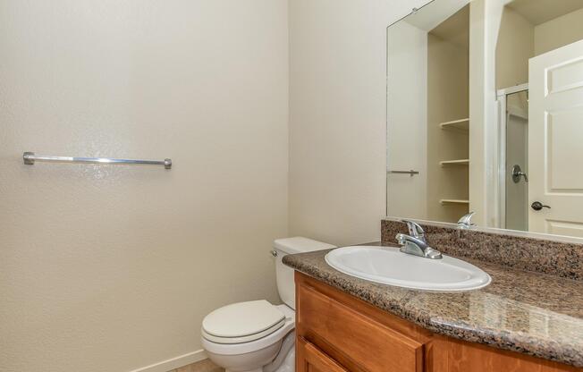 a double sink and large mirror