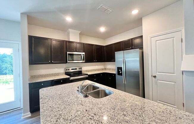 New Construction 3BD, 2.5BA Wendell Townhome with a 1-Car Garage in an HOA Community