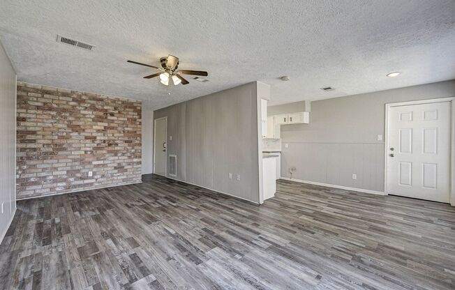 Charming white brick home with lots of upgrades nestled in the desirable neighborhood