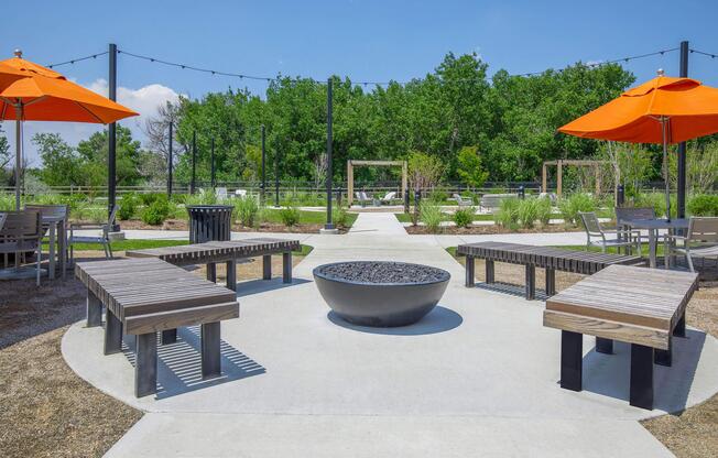 a group of lawn chairs sitting on top of a picnic table