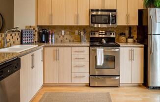 updated kitchen with stainless steel appliances