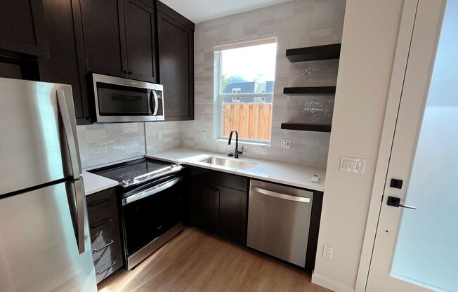 Brand New Townhome-Style Apartments with Laundry in Unit, A/C, Private Patios