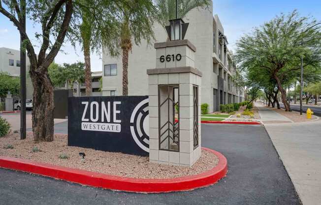 a sign that says zone westgate in front of a building