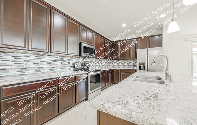 10915 E CALYPSO AVE