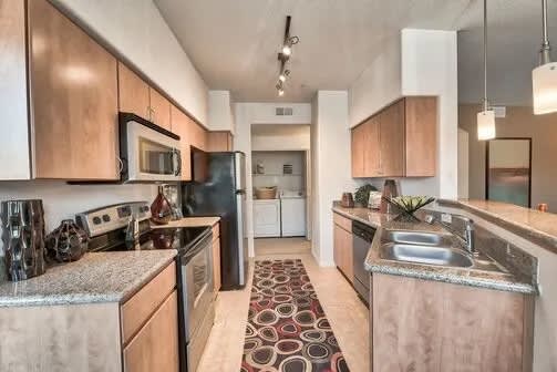 Kitchen and Appliances at Aldea at Estrella Falls Apartment Homes in Goodyear AZ