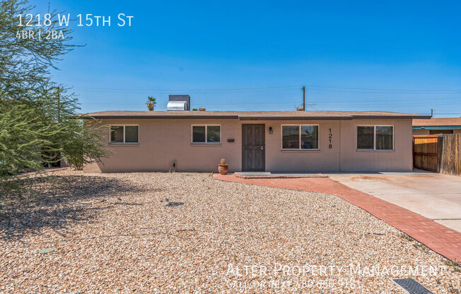 1218 W 15 ST