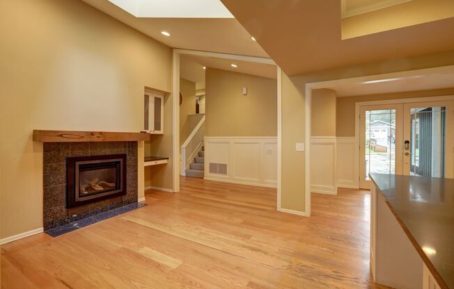Mercer Island: 5-Bed, 4-Bath Home with Water Views, Large Yard, Updated Kitchen, Private Primary Suite