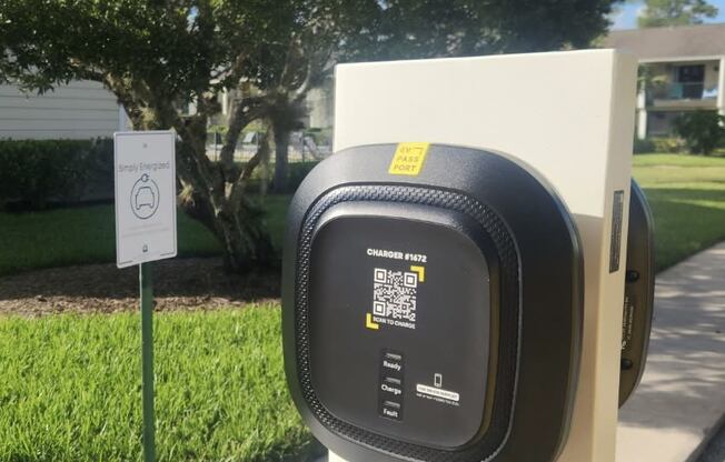 a parking meter on the side of a sidewalk