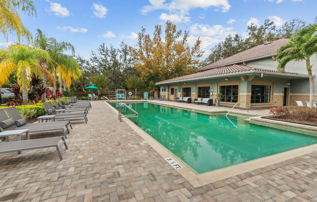 The Preserve at Westchase Apartments pool with lounge seating