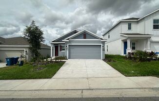 Brand New 3 Bedroom, 2 Bath Single Family Home with Two Car Garage in Davenport!