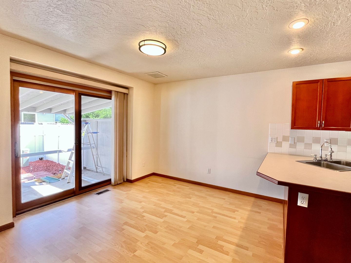 Spacious 3 bedroom/3 bath Townhome with 2 car Attached Garage and Private Yard in Evans, CO