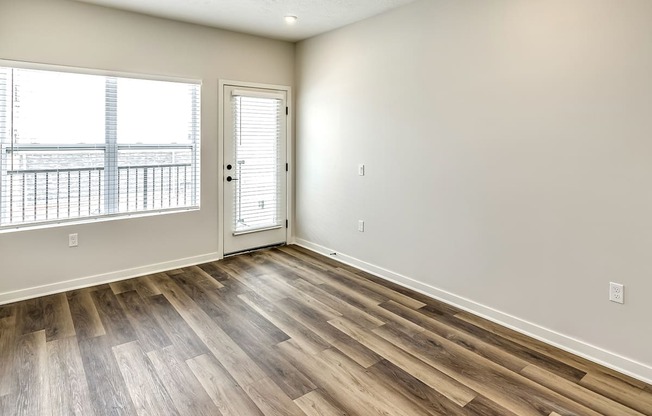 Studio, one and two bedroom apartment homes featuring stainless steel appliances, luxury vinyl floor, granite countertops, large closets and full-size washer and dryer at The Parker in Papillion, NE