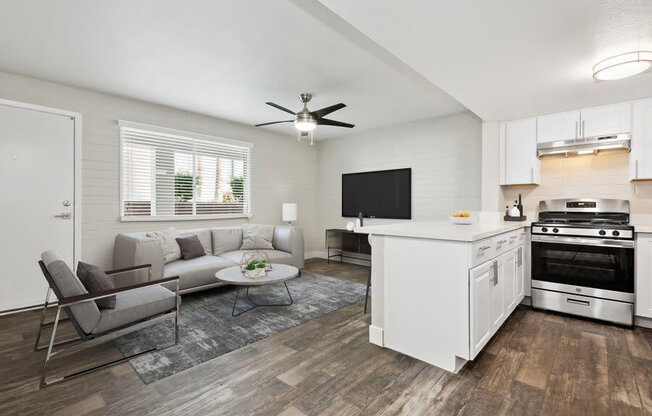 Model living room and kitchen showcasing open living space