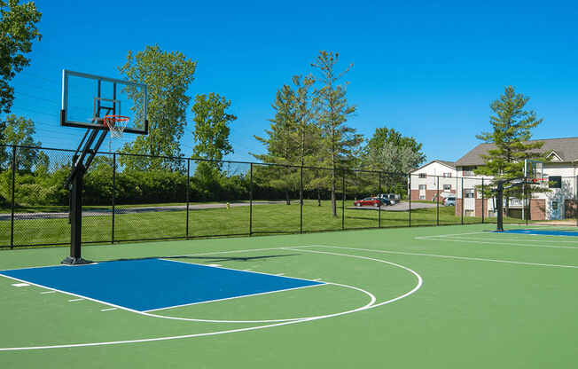 the basketball court at the enclave at blue sky apartments ga