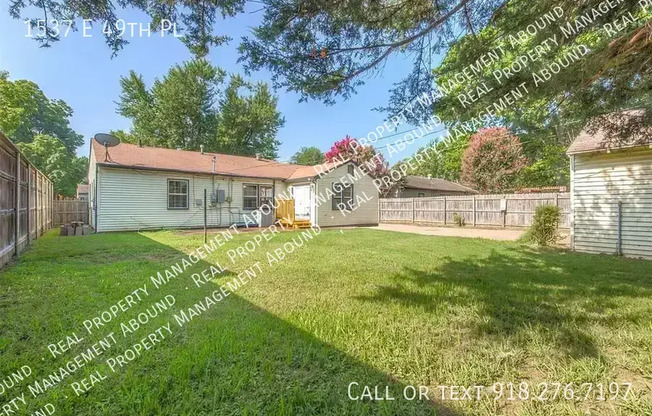 1537 E 49 PL