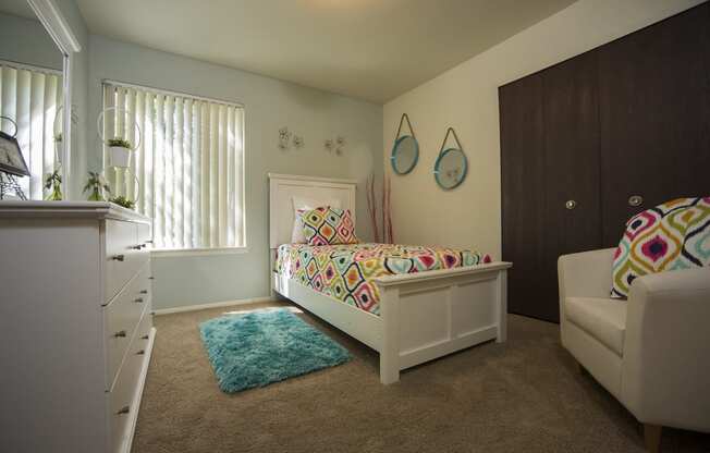 Bedroom with large closetes at Westwood Village Apartments, Michigan