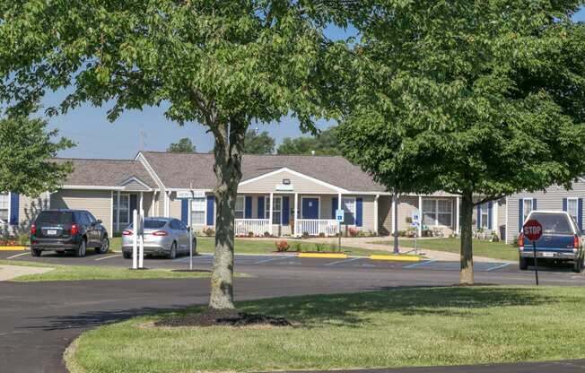 Entryway of Clubhouse with trees 