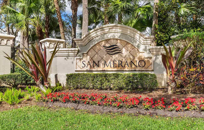 A sign that says Sammerano in front of some plants.