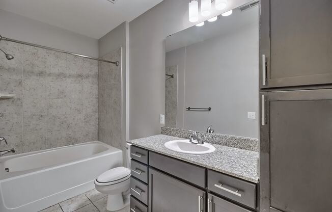 a bathroom with a sink toilet and a shower at Nexus at Sandhill, Columbia